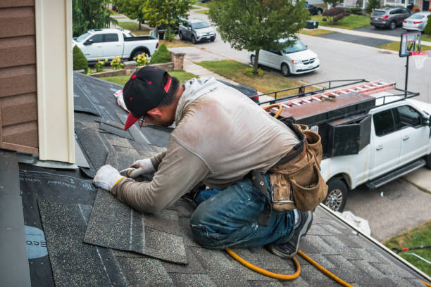 Professional Roofing technician working in Sun City, CA